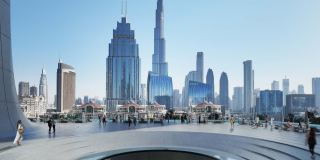 The podium pool at Akala with the Dubai skyline beyond.