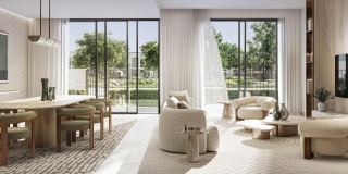 Living and dining room at ALVA opening through full-height glazing to the garden.