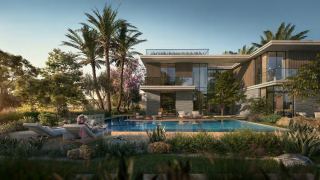 Six-bedroom Premium villa at Athlon with its pool and terrace at dusk.