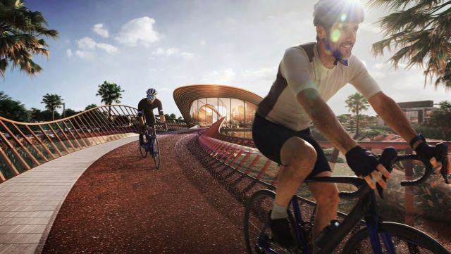 Cyclist crossing the bridge on the Athlon cycling loop.
