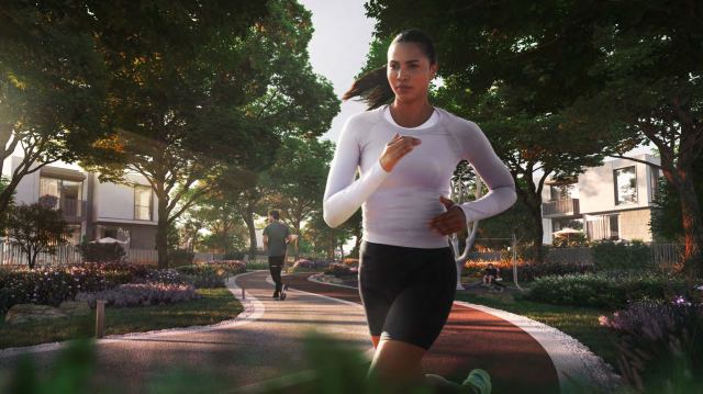 Runner on the trail loop through the Athlon parkland.