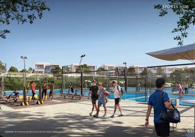 Sports hub at Y Views with padel and tennis courts and an outdoor gym, backed by hillside villas.