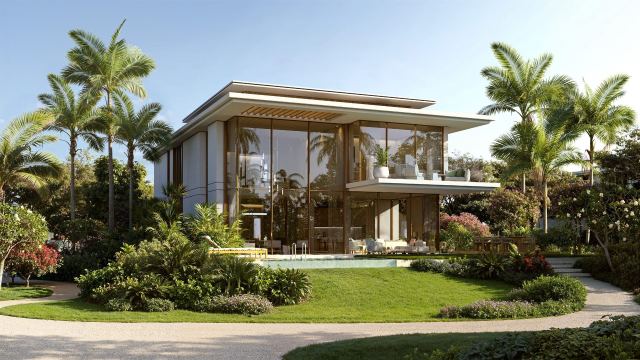 A 4-bedroom garden villa surrounded by palms at Bay Estate