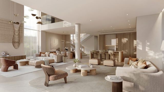 Double-height living room in a Bay Estate garden villa