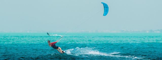 Kite surfing off Fahid Island.