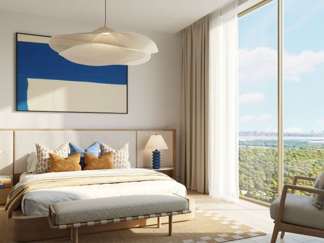 A bedroom at The Beach House Fahid looking out over the island.