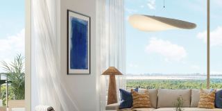 Living room in an apartment at The Beach House Fahid, opening to the view.