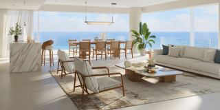 Living room at Fahid Beach Terraces opening to the sea.