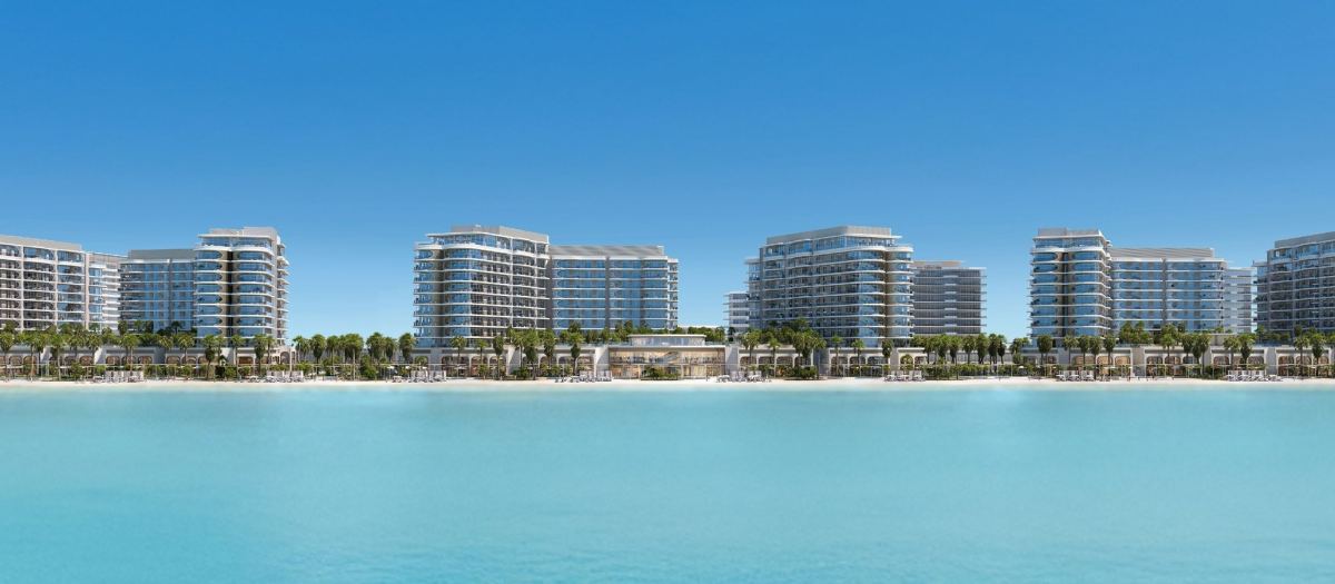 The six towers of Fahid Beach Terraces seen from the water.
