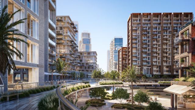 Landscaped plaza and residential towers inside the Dubai Design District masterplan