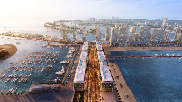 Dubai Harbour from the air, with the marina basins, the cruise pier and the towers along the shoreline