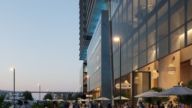 Restaurants and retail on the promenade at Dubai Harbour at dusk