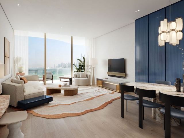 Living and dining room at Dubai Harbour Residences in the nautical blue and white palette.