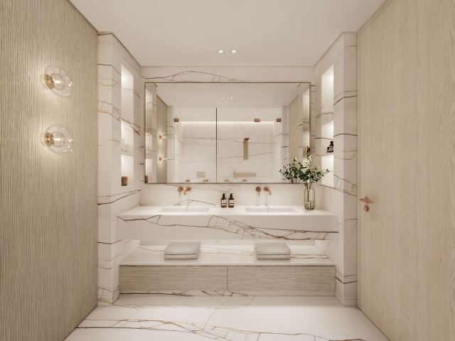Master bathroom at Dubai Harbour Residences in book-matched stone.