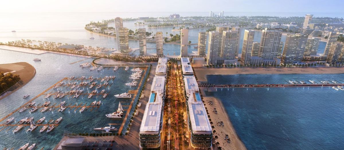 Dubai Harbour from the air, with the marinas and the beach where Dubai Harbour Residences sits.