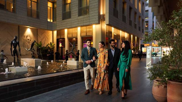 Gate Village at DIFC in the evening, its restaurants and galleries lit