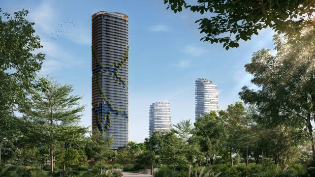 Towers rising above the trees of the Forest District at Dubai Maritime City