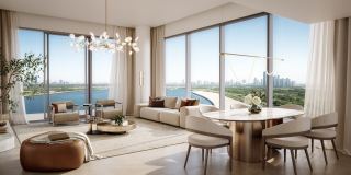 Living and dining space in a residence at The Edit at d3, opening to the water.