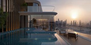 The penthouse terrace pool at The Edit at d3 at sunset.