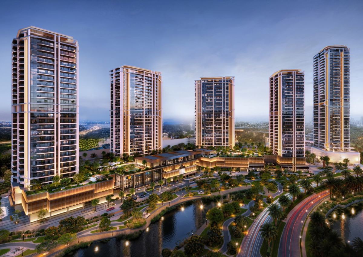 Aerial view of Eltiera Views at dusk, with the towers rising above the lakes at Jumeirah Islands.