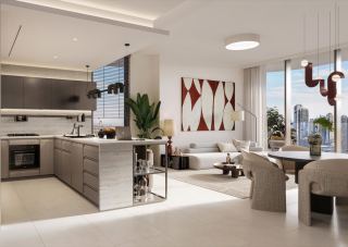 Kitchen and living area of an Eltiera Views apartment, with 3.6 metre ceilings and city views.