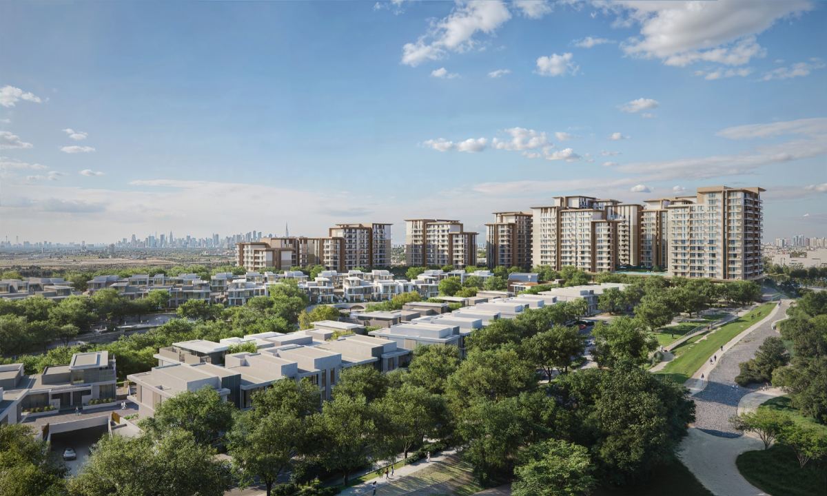 Wide aerial of Expo Valley with the Expo Valley Views buildings and the Dubai skyline behind