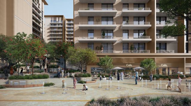 Community plaza at Expo Valley Views with cafés, water play and shaded seating