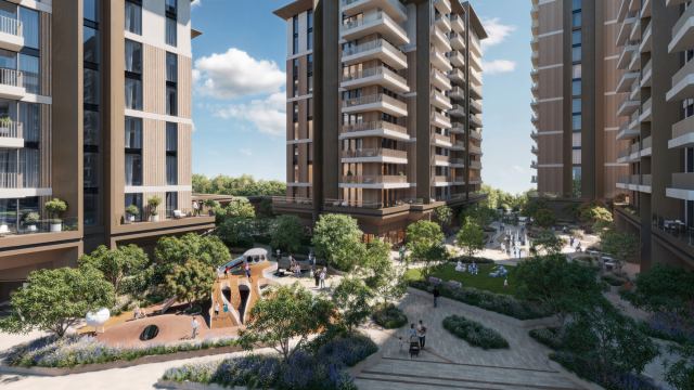 Landscaped courtyard and children's play area between Expo Valley Views buildings