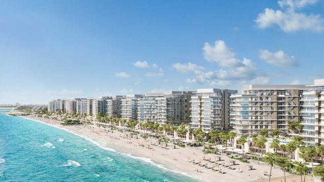 The beachfront promenade at Fahid Island, the homes set back from the sand