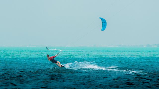 Kite surfing off the beach at Fahid Island