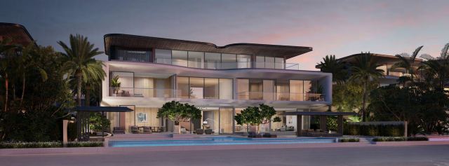 A Coral Collection villa at dusk on Frond F, Palm Jebel Ali.