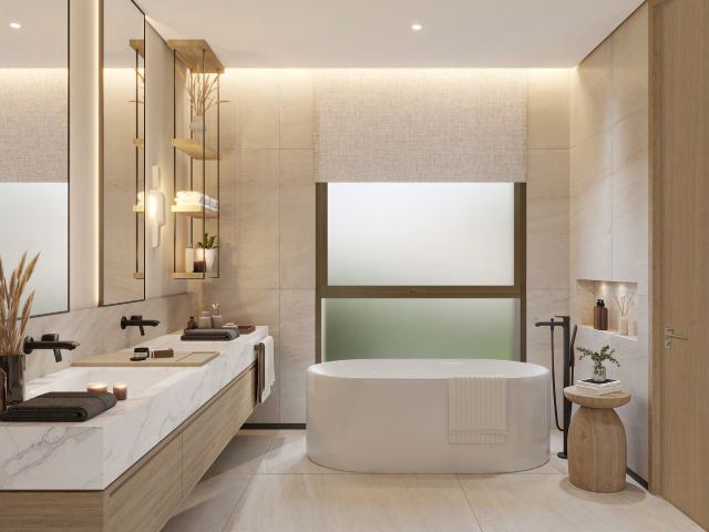 Master bathroom in stone at a Palm Jebel Ali villa.