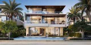 A Frond F villa on the water at Palm Jebel Ali, seen from the beach.