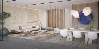 Open-plan living and dining room opening to the sea at Frond F.
