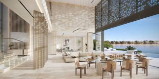 Double-height living space in a Coral Collection villa at Frond F.
