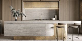 The show kitchen in a residence at Four Seasons Private Residences DIFC, with a stone island.