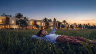 The desert stargazing lawns at Al Ghadeer Gardens under open sky.