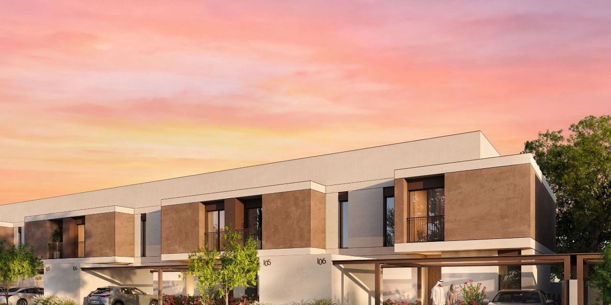 A townhouse at Al Ghadeer Parks, with its shaded terrace and private garden.
