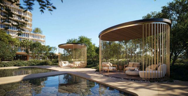 Zen lounge pavilion beside the water at HADO.