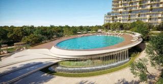 Infinity pool with waterfall edge at HADO, Dubai Islands.