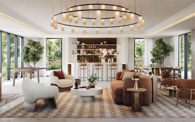 Residents' clubhouse lounge with bar and games tables at The Heights by Emaar.