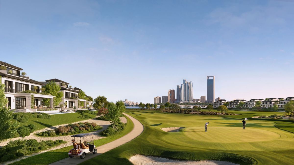Golf-front villas at Hudayriyat Golf Estates overlooking a fairway.