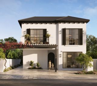 Front elevation of a villa at Hudayriyat Golf Estates, showing the Andalusian architecture and arched entry.