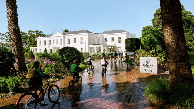 The private school within Hudayriyat Golf Estates, with cycling paths through landscaped grounds.