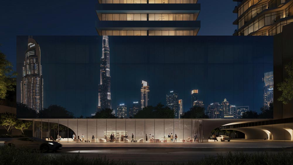 Inaura's sculpted podium at street level, with the Burj Khalifa behind.