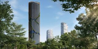 Kanyon by Beyond rising above the trees of the Forest District in Dubai Maritime City, with the green ribbon on its façade.