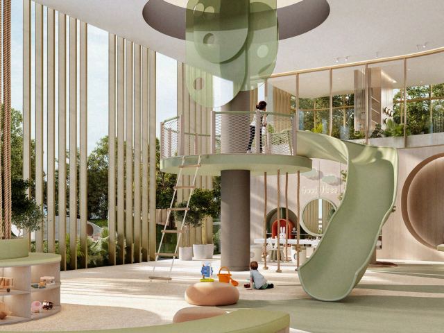 The indoor kids area at Kanyon, with a play tower and slide.