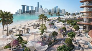 Beach cabanas and shaded loungers on the 5.6 kilometre beachfront at Marsa Al Saadiyat.