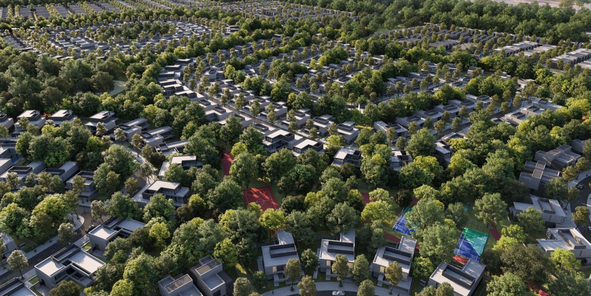 Aerial view of Masaar 3 in Sharjah, showing villas and townhouses set within the forested master plan.