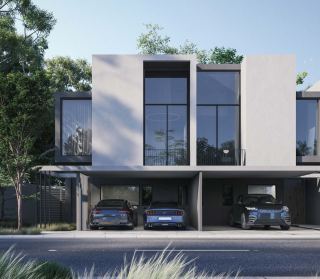 Four-bedroom villa at Masaar 3, with covered parking for two cars.